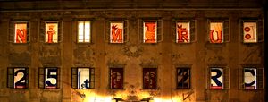 The facade of the <!--LINK'" 0:965--> building - the installation for the campaign "No peace. Only searching." <!--LINK'" 0:966-->, 2006