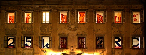 The facade of the Scientific Research Centre (ZRC SAZU) building - the installation for the campaign "No peace. Only searching." Poper Studio, 2006