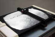 Nanoplotter uses a plotter, an obsolete printing machine from the Eighties, adapted to an uncommon operation, BridA at the U3, Museum of Modern Art, Ljubljana, 2010