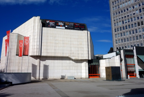 Cankarjev dom, Cultural and Congress Centre with a monument to Ivan Cankar (by Slavko Tihec) on the main platform, 2013. The centre was designed by Slovenian architect Edvard Ravnikar in 1977, and constructed in the early 1980s.