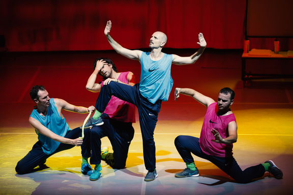 Dancers transforming the stage into a football stadium during 2:0 dance performance, Fičo Balet, 2016.