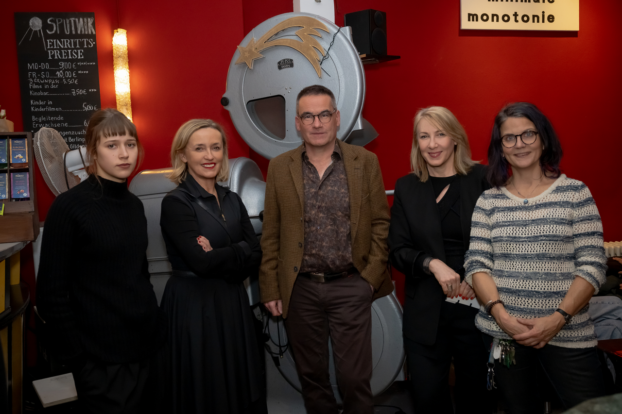 The opening of the SloVision – Slovenian Film Days at Kino Sputnik, 2025. From left to right: actress Jara Sofija Ostan, director of the Slovenian Film Centre Nataša Bučar, festival curator Bernd Buder, Head of SKICA Berlin Saša Šavel Burkart, and Kino Sputnik manager Andrea Stosiek. Photo: Regina Sablotny