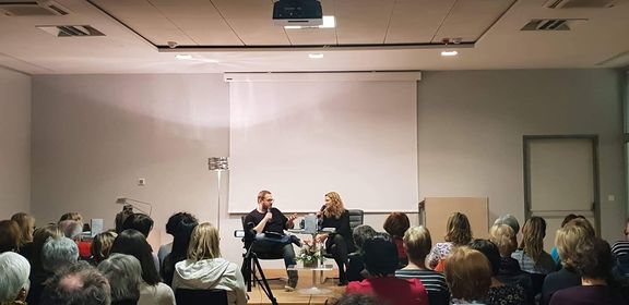 Author Bronja Žakelj speaks with Sašo Stare at Kranj City Library.