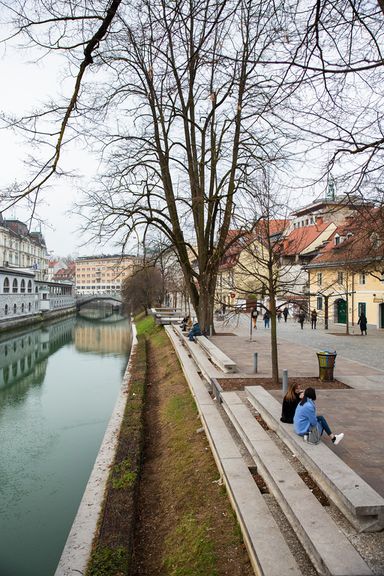 A resting place on the renovated banks of the Ljubljanica River in Ljubljana.