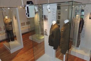 <i>Bohinj 1941&ndash;1945</i> exhibition section at the <!--LINK'" 0:468-->. It features the four dwellers of Bohinj, who during the World War II impersonated different roles: of an an agressor, a partisan, a priest and a prisoner, respectively.