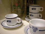 Coffee cups of the Jeklotehna Maribor and TAM (Tovarna avtomobilov Maribor) factories. From the Memorial to Maribor Industry â Industrial Maribor in 20th Century permanent exhibition