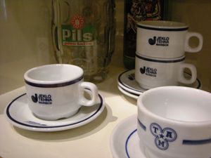 Coffee cups of the Jeklotehna Maribor and TAM (Tovarna avtomobilov Maribor) factories. From the <i>Memorial to Maribor Industry â Industrial Maribor in 20th Century</i> permanent exhibition