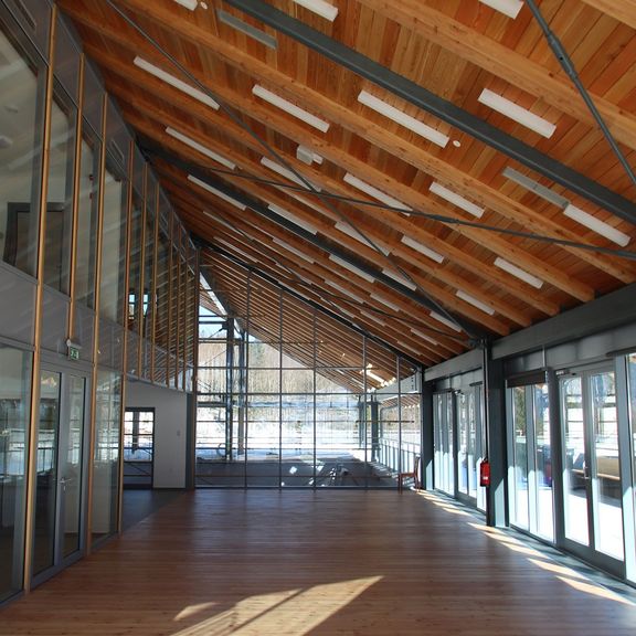 The service building Čaplja interior at the Nordic Centre Planica, designed by STVAR architects, 2016